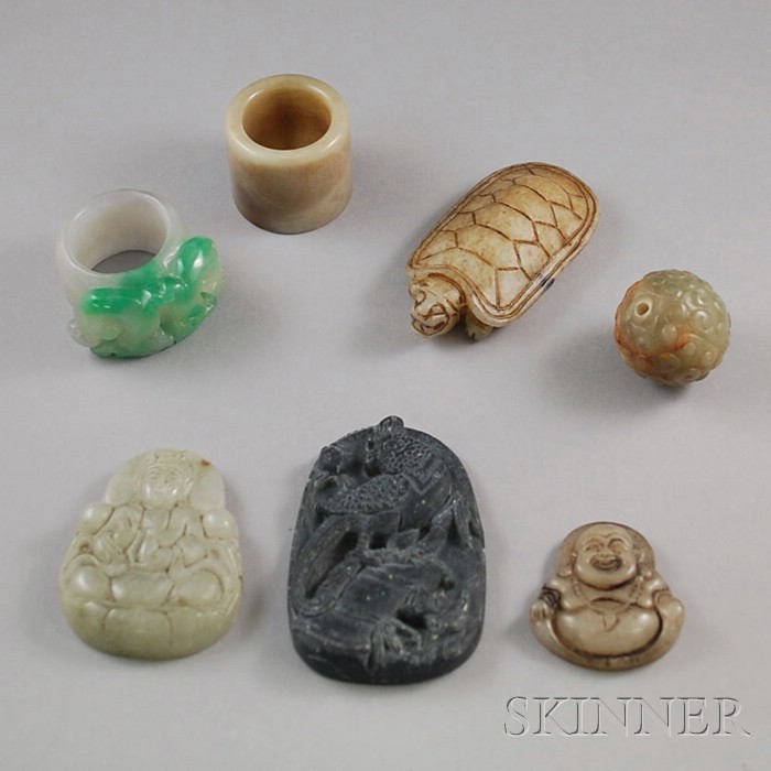 Appraisal: Seven Carved Jade and Stone Items including a round pendant