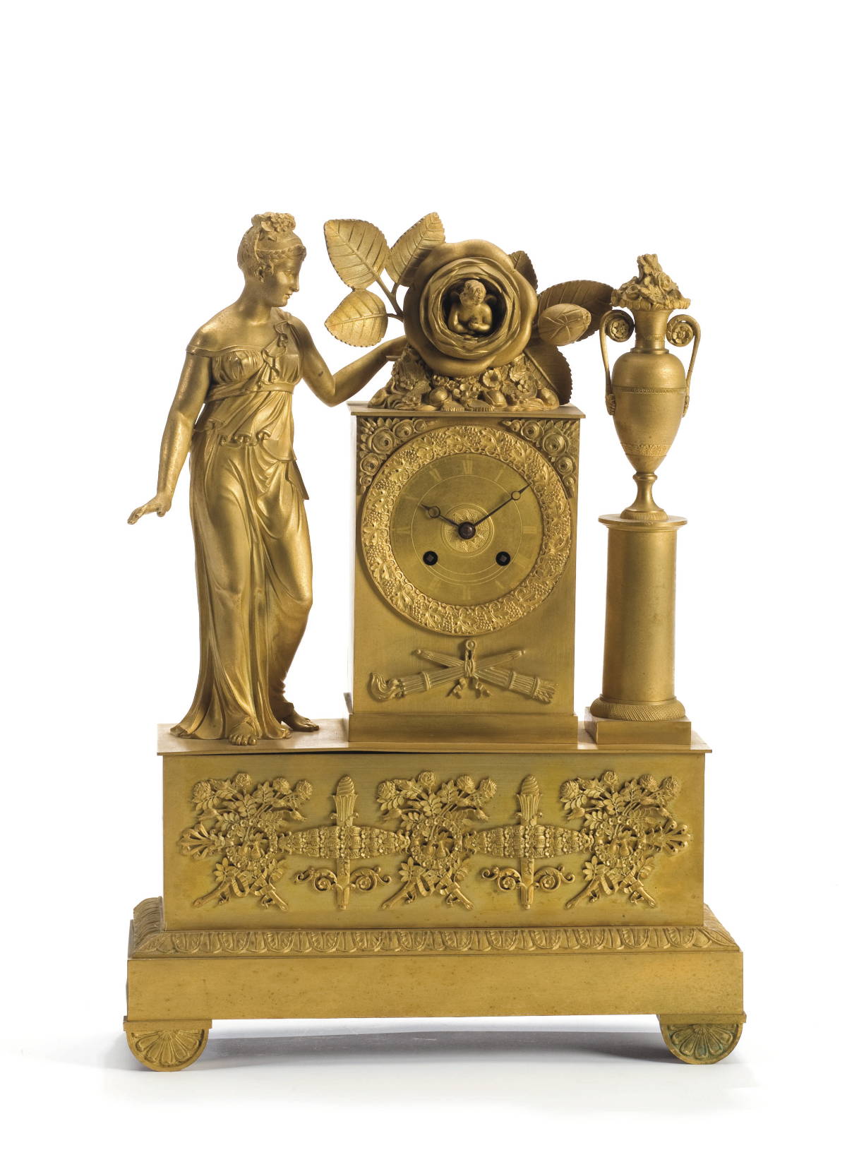 Appraisal: FRENCH NEOCLASSICAL GILT-METAL MANTEL CLOCK The finial crested with cupid