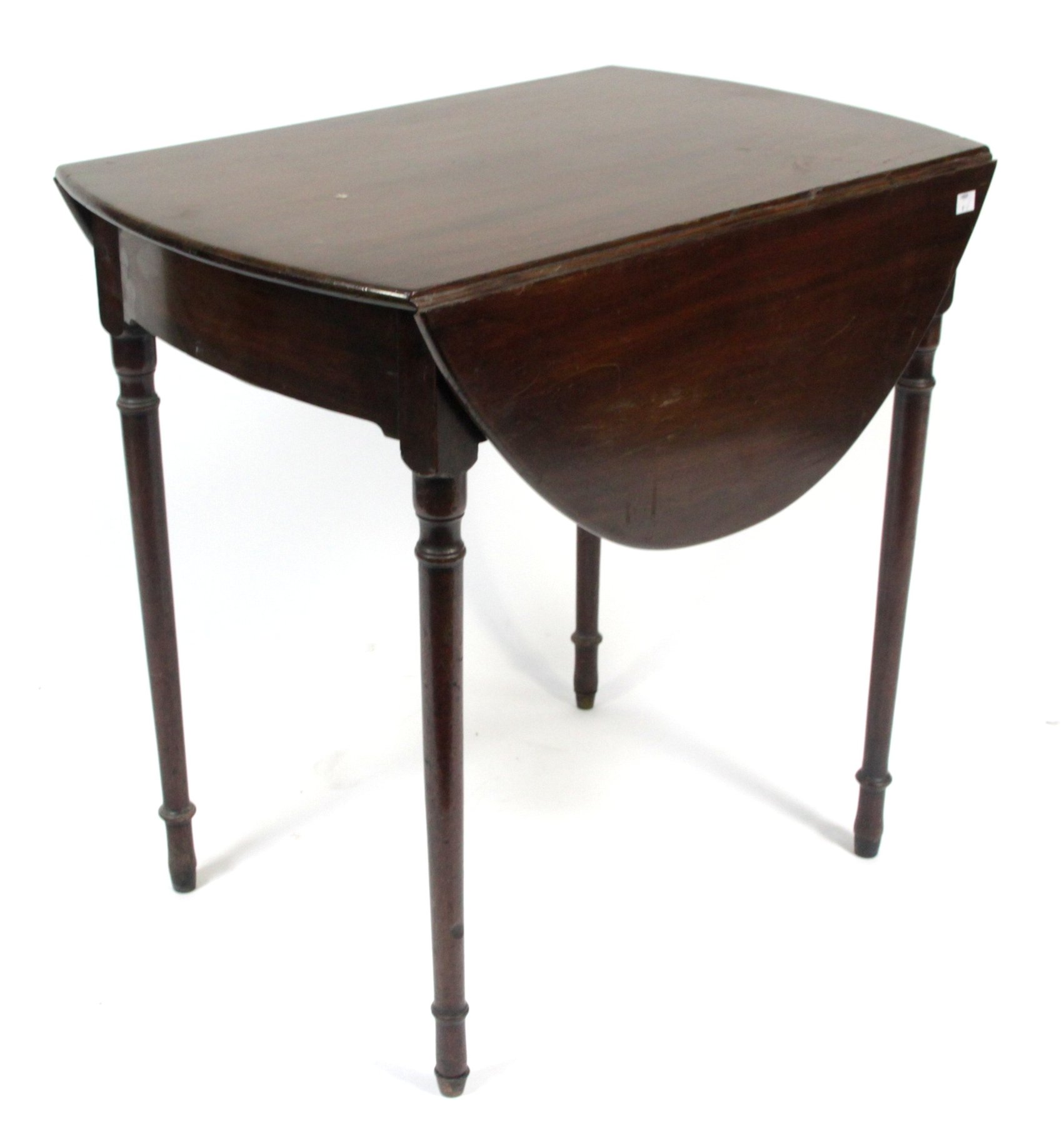 Appraisal: A mahogany Pembroke table fitted a single drawer on turned