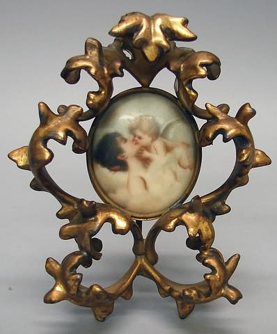 Appraisal: Gold finished rococo cast metal frame x S