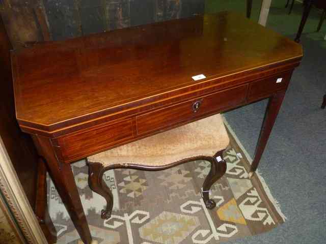 Appraisal: A TH CENTURY MAHOGANY FOLD OVER TOP TEA TABLE with