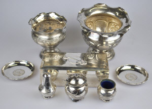 Appraisal: A pair of Chinese sterling coin-set ashtrays a grade three-piece