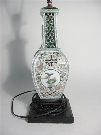 Appraisal: Chinese porcelain famille rose and carved vaseConverted to a lamp