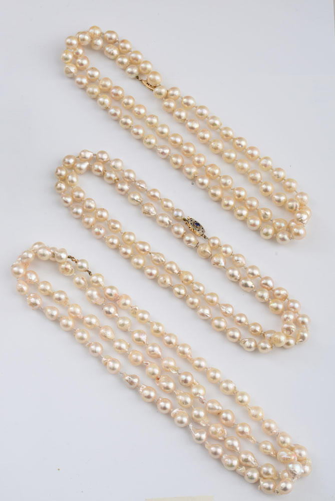 Appraisal: THREE BAROQUE CULTURED PEARL NECKLACES The three necklaces nest together