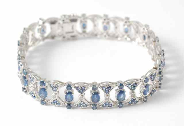 Appraisal: DIAMOND SAPPHIRE AND FOURTEEN KARAT WHITE GOLD BRACELET Estimated total