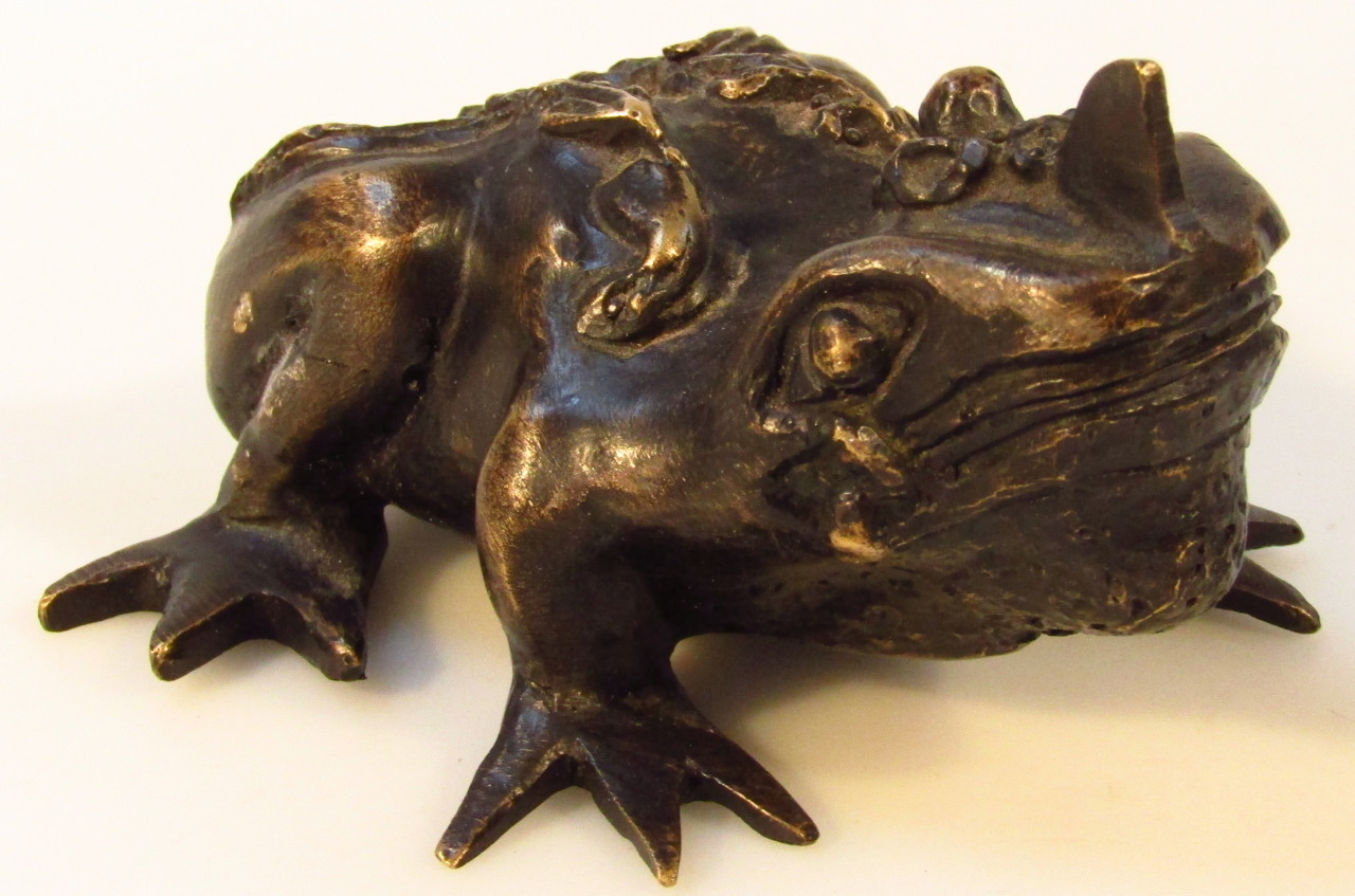 Appraisal: A Japanese Taisho period bronzed figure of a toad crouched