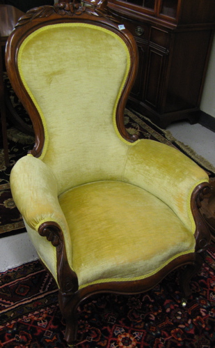 Appraisal: VICTORIAN BALLOON-BACK ARMCHAIR American late th century having a molded