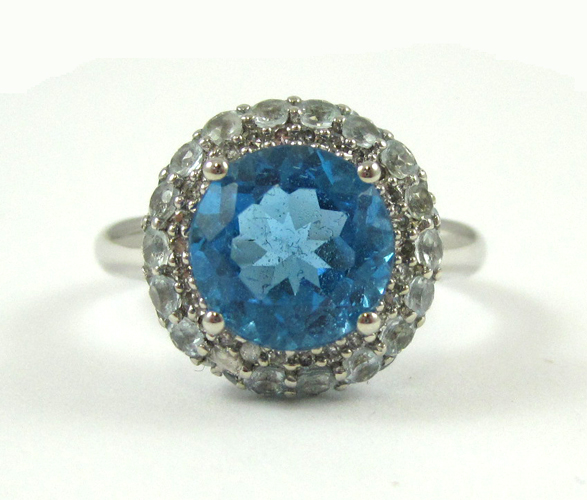 Appraisal: BLUE TOPAZ DIAMOND AND WHITE GOLD RING The k white