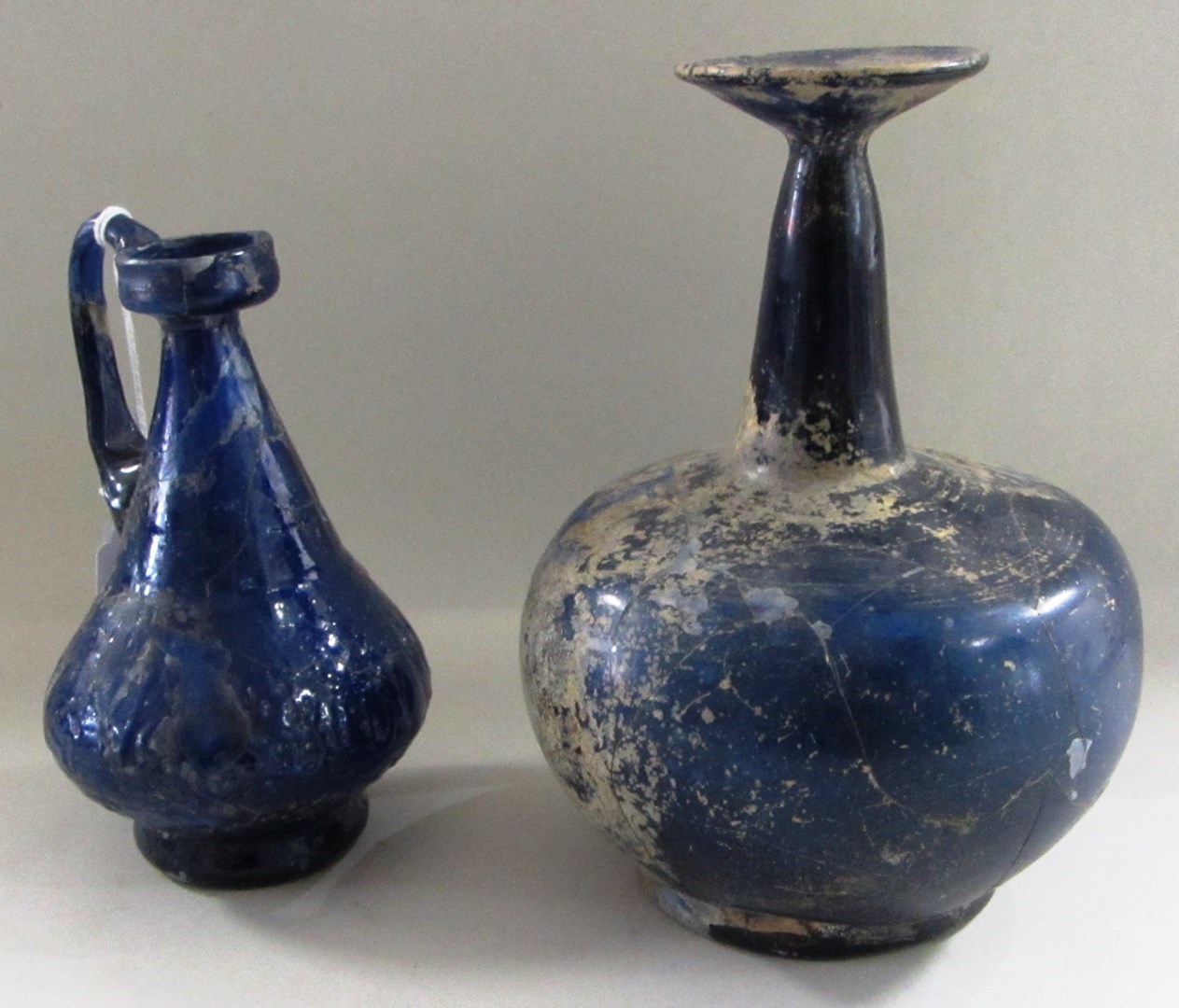 Appraisal: A group of cobalt blue and clear glass vessels and