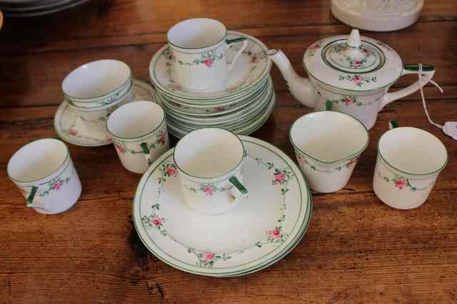 Appraisal: AN OLD ENGLISH CHINA CHILD'S PART TEASET painted green swags