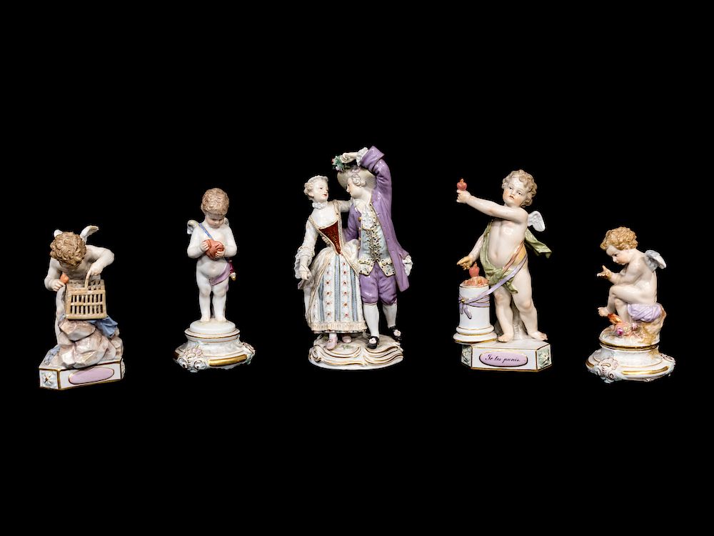 Appraisal: Four Meissen Porcelain Figures of Cupid and a German Porcelain