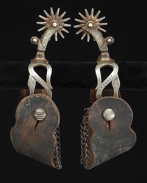 Appraisal: A pair of silver-mounted California style 'snake' spurs signed Garcia