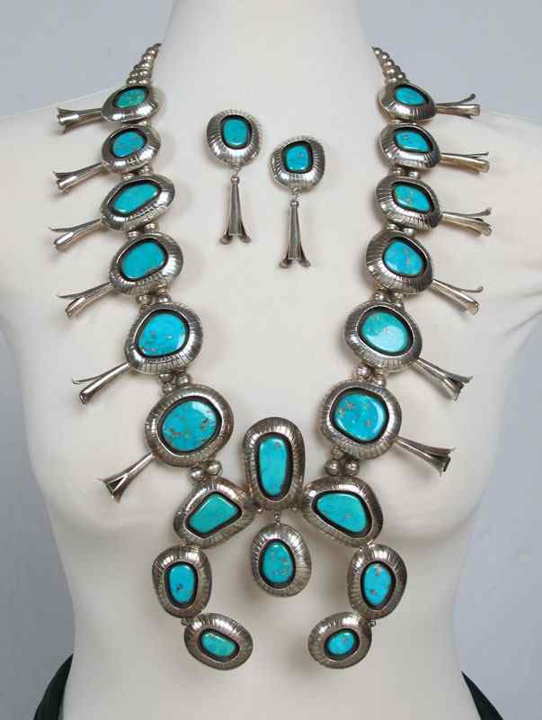 Appraisal: STERLING SILVER TURQUOISE SQUASH BLOSSOM NECKLACE EARRINGS BY THOMPSON PIASO