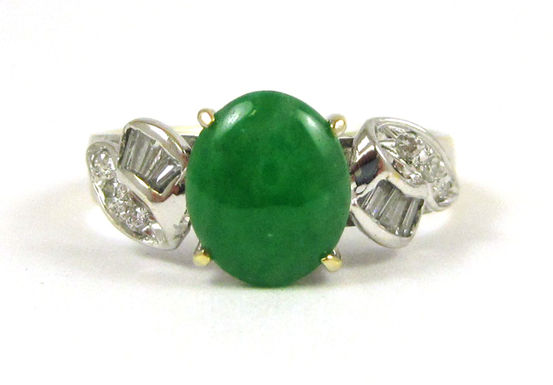 Appraisal: GREEN JADE AND DIAMOND RING k white gold with round-cut