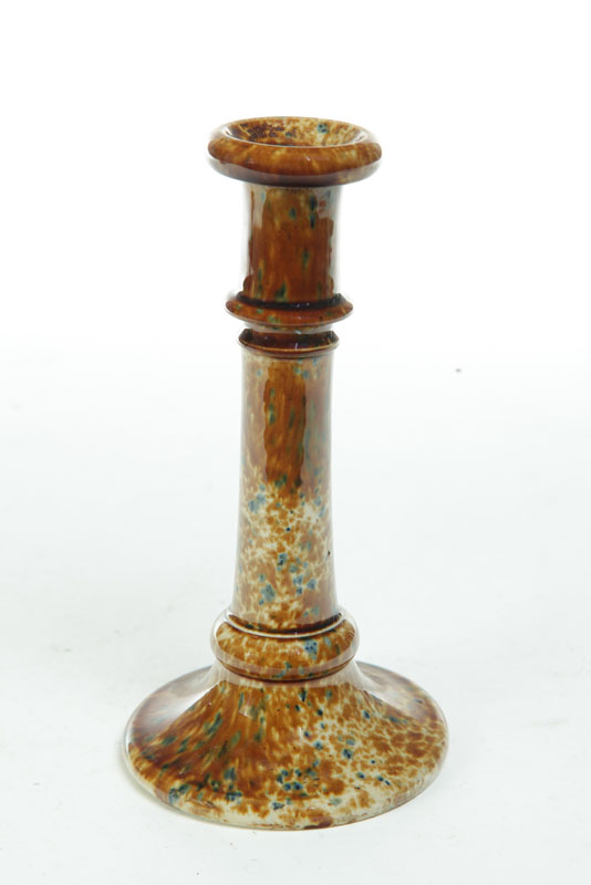 Appraisal: BENNINGTON CANDLESTICK Vermont mid th century Flint enamel in amber