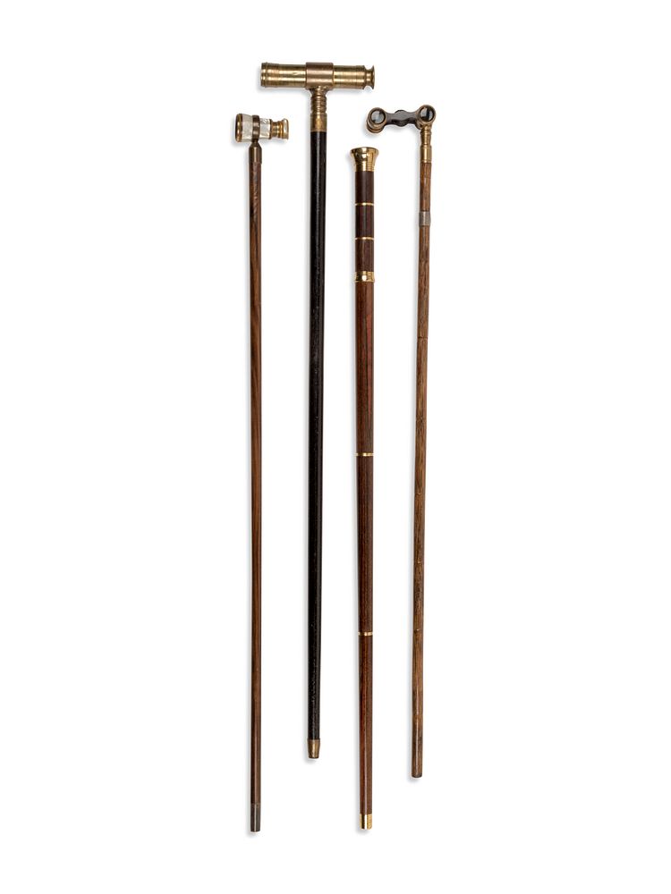 Appraisal: Four Brass-Mounted Optical System Walking Sticks Four Brass-Mounted Optical System