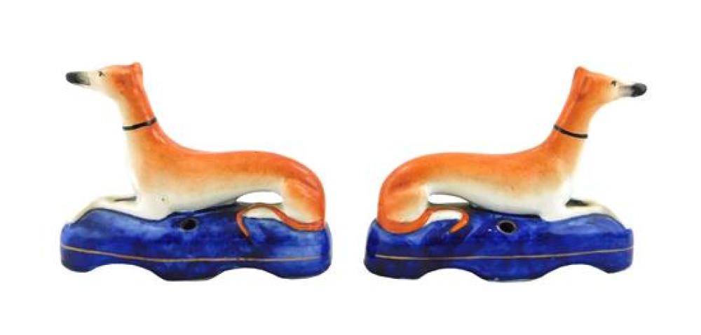 Appraisal: Pair of Staffordshire reclining whippet pen holders th C both