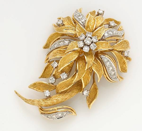 Appraisal: A diamond flower brooch estimated total diamond weight carats mounted