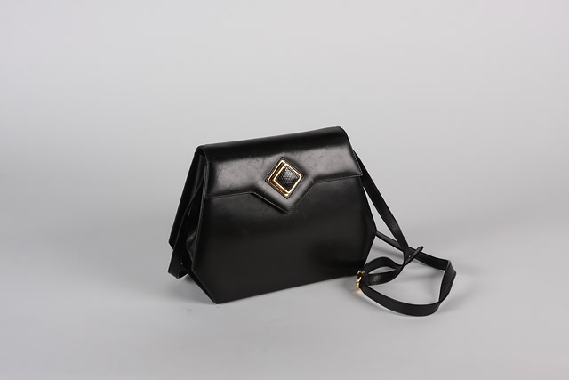 Appraisal: Salvatore Ferragamo black leather handbag diamond shape press closure shoulder