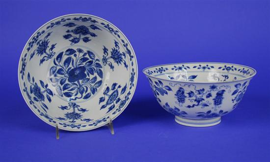 Appraisal: PAIR OF CHINESE BLUE AND WHITE BOWLS Kangxi period bears