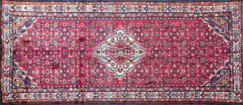 Appraisal: PERSIAN HAMADAN Runner with floral medallion and field on a