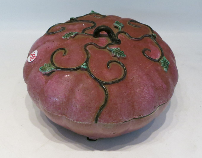 Appraisal: CHINESE PORCELAIN SWEETMEAT DISH of persimmon form with applied leaf