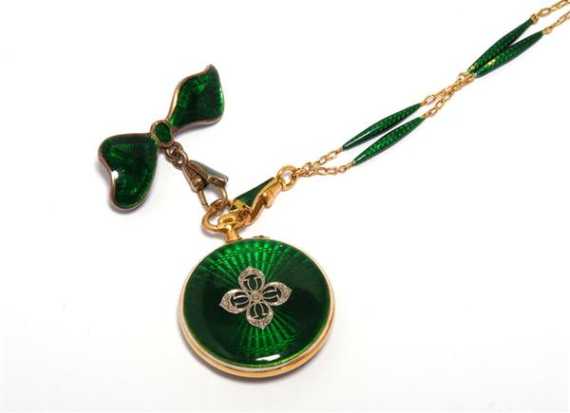 Appraisal: ENAMEL AND DIAMOND PENDANT WATCH WITH CHAIN AND BROOCH France