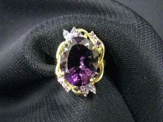 Appraisal: Gemstone Ring large oval rich amethyst highlighted by various gems