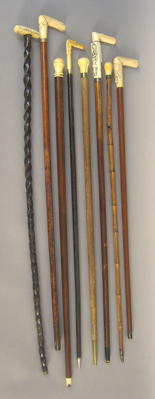 Appraisal: Eight ivory grip canes