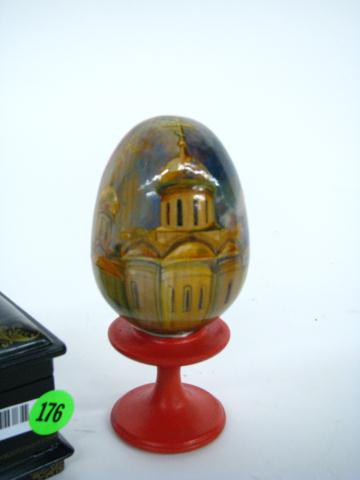 Appraisal: A Russian hand painted wooden egg on Pedestal '' high