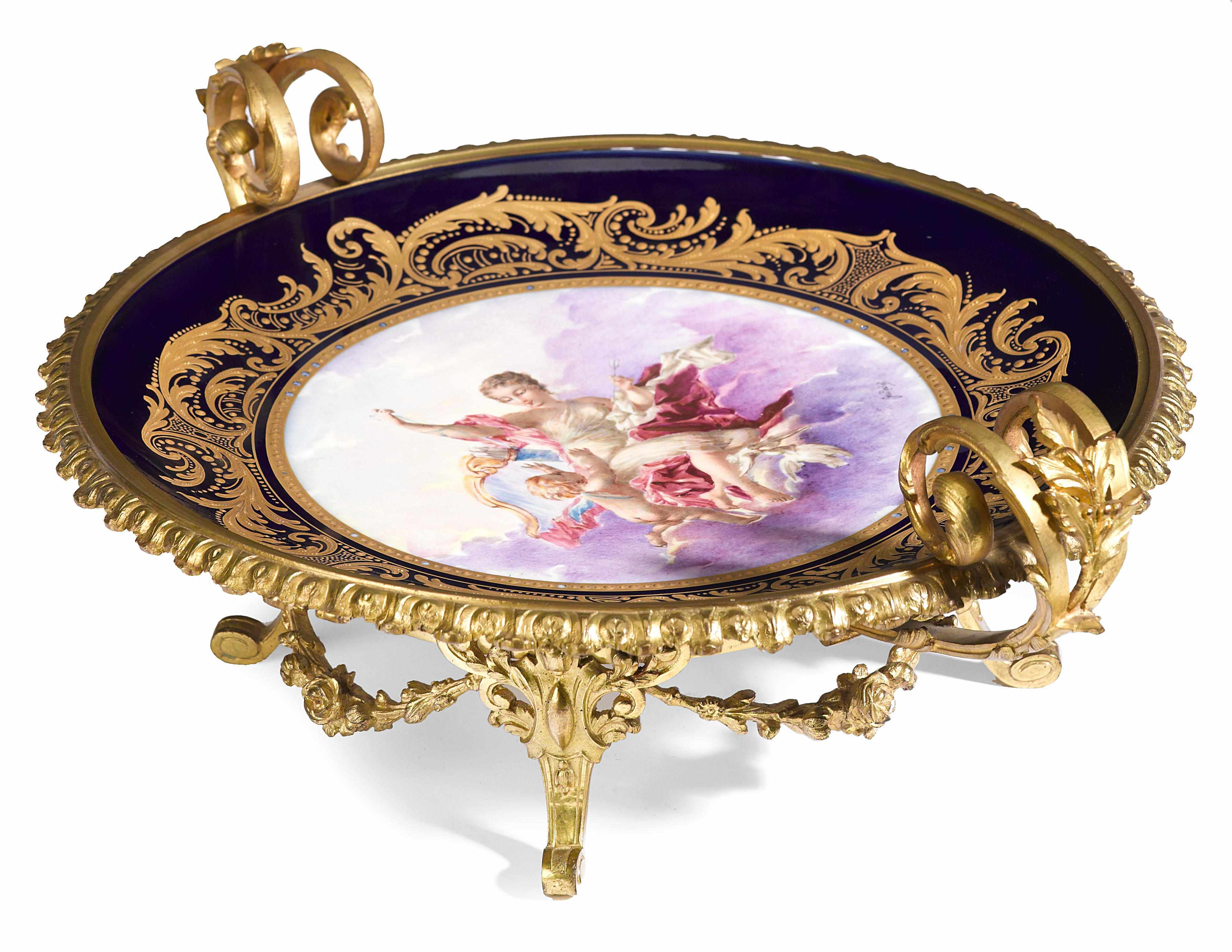 Appraisal: A Svres style porcelain gilt bronze mounted centerpiece first half