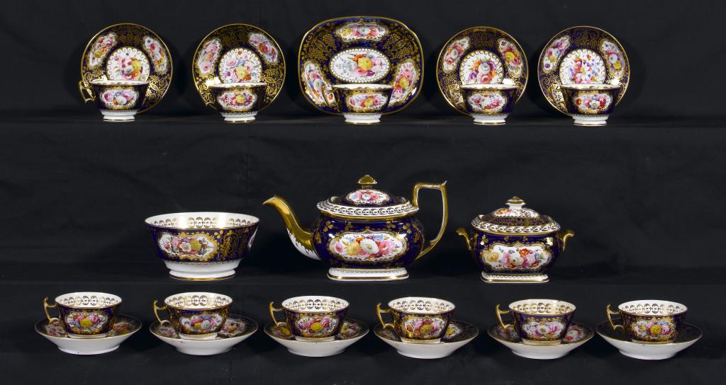 Appraisal: A COALPORT COBALT GROUND TEA SERVICE of London shape painted