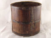 Appraisal: A country made riveted iron bound coopered elm bucket with