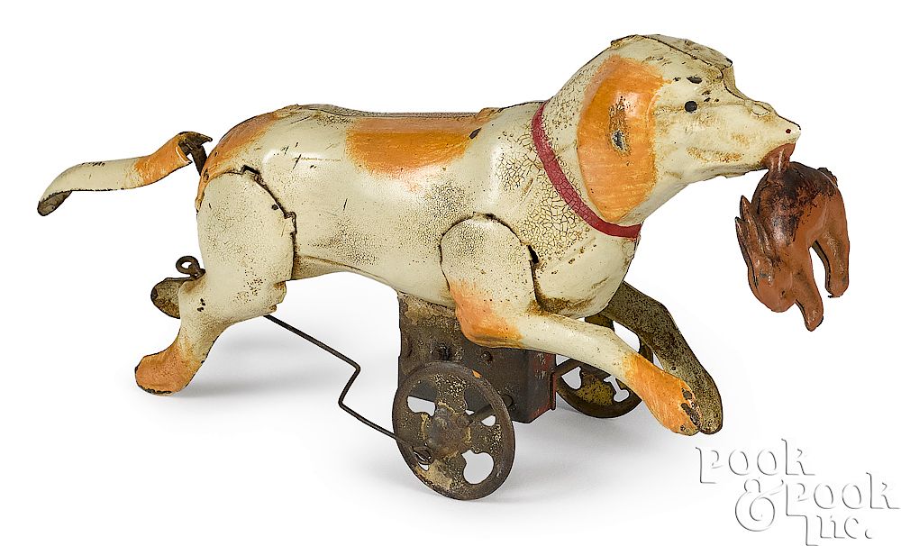 Appraisal: Gunthermann tin wind-up running dog with a rabbit Gunthermann painted