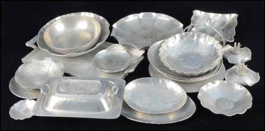 Appraisal: COLLECTION OF HAMMERED ALUMINUM SERVING PIECES AND TABLE ARTICLES With