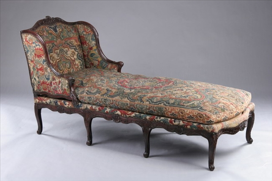 Appraisal: REGENCE CARVED WALNUT GROS-POINT NEEDLEWORK UPHOLSTERED EIGHT-LEG DUCHESSE th century