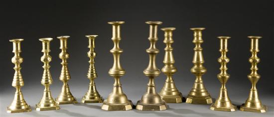 Appraisal: Group of ten brass candlesticks Pair of candlesticks with octagonal