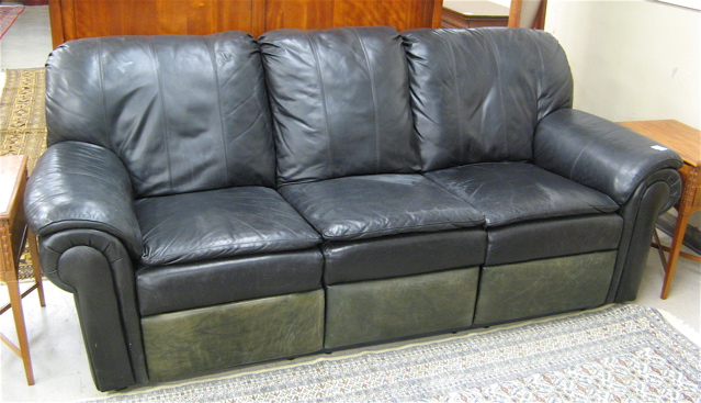 Appraisal: CONTEMPORARY DOUBLE-RECLINER LEATHER SOFA traditional styling overall dark olive green