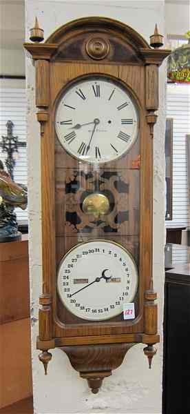 Appraisal: SETH THOMAS OFFICE CALENDAR NO an oak cased double-dial calendar