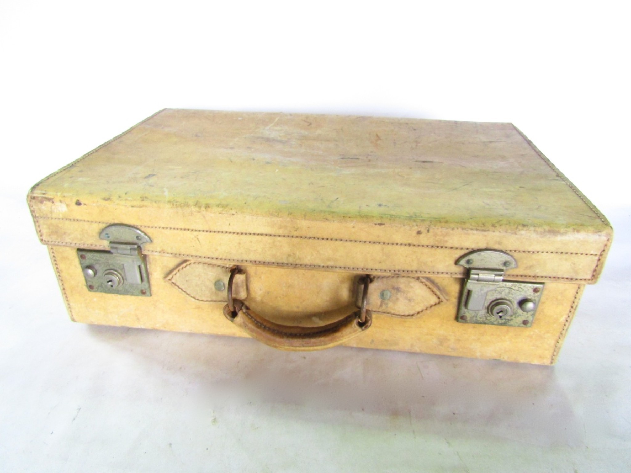 Appraisal: A vintage stitched vellum trunk with dual lever locks revealing