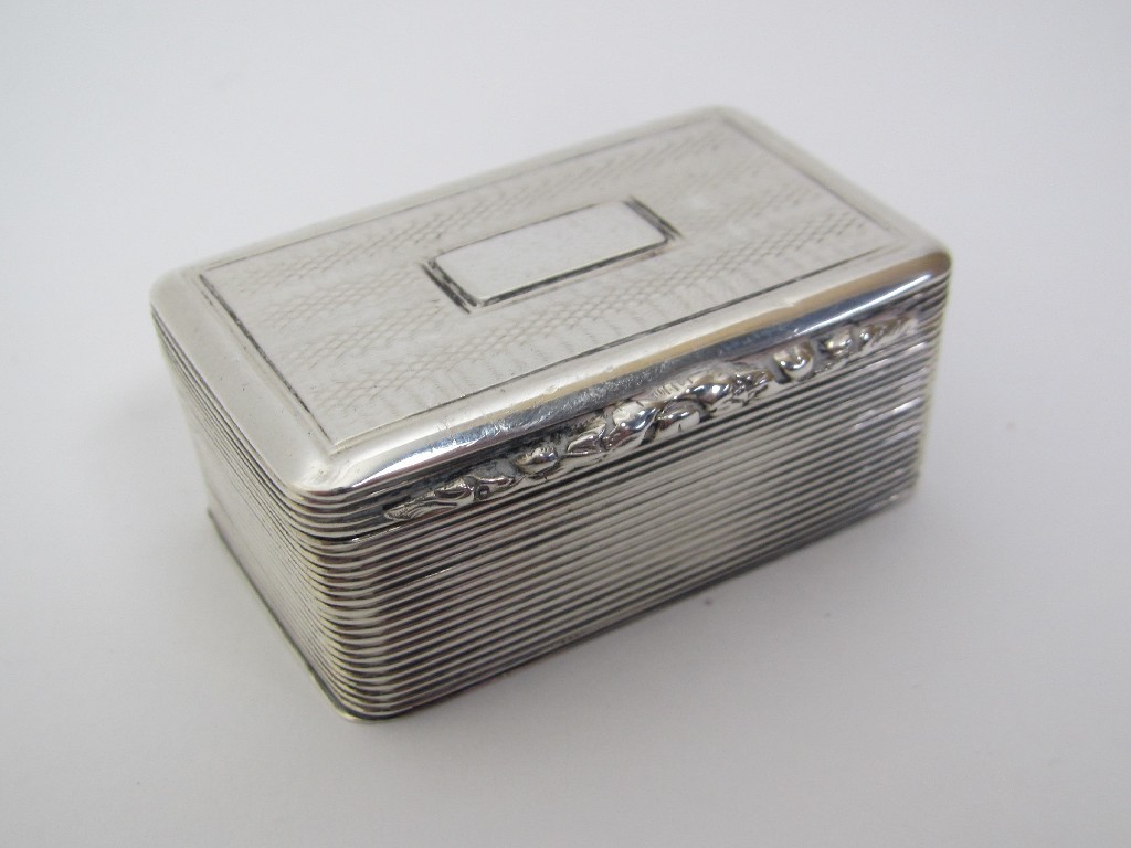 Appraisal: A silver engine turned nutmeg grater with foliate thumbpiece maker