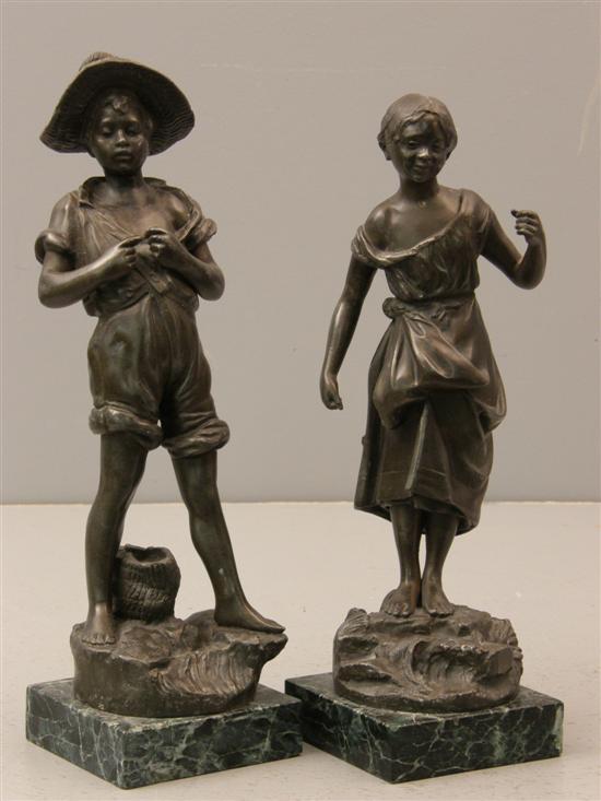 Appraisal: Two spelter figures on marble plinths of a boy and