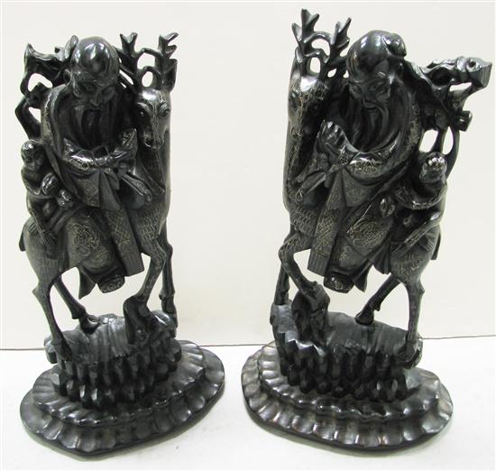 Appraisal: Pair of Chinese carved wooden figures of the God of