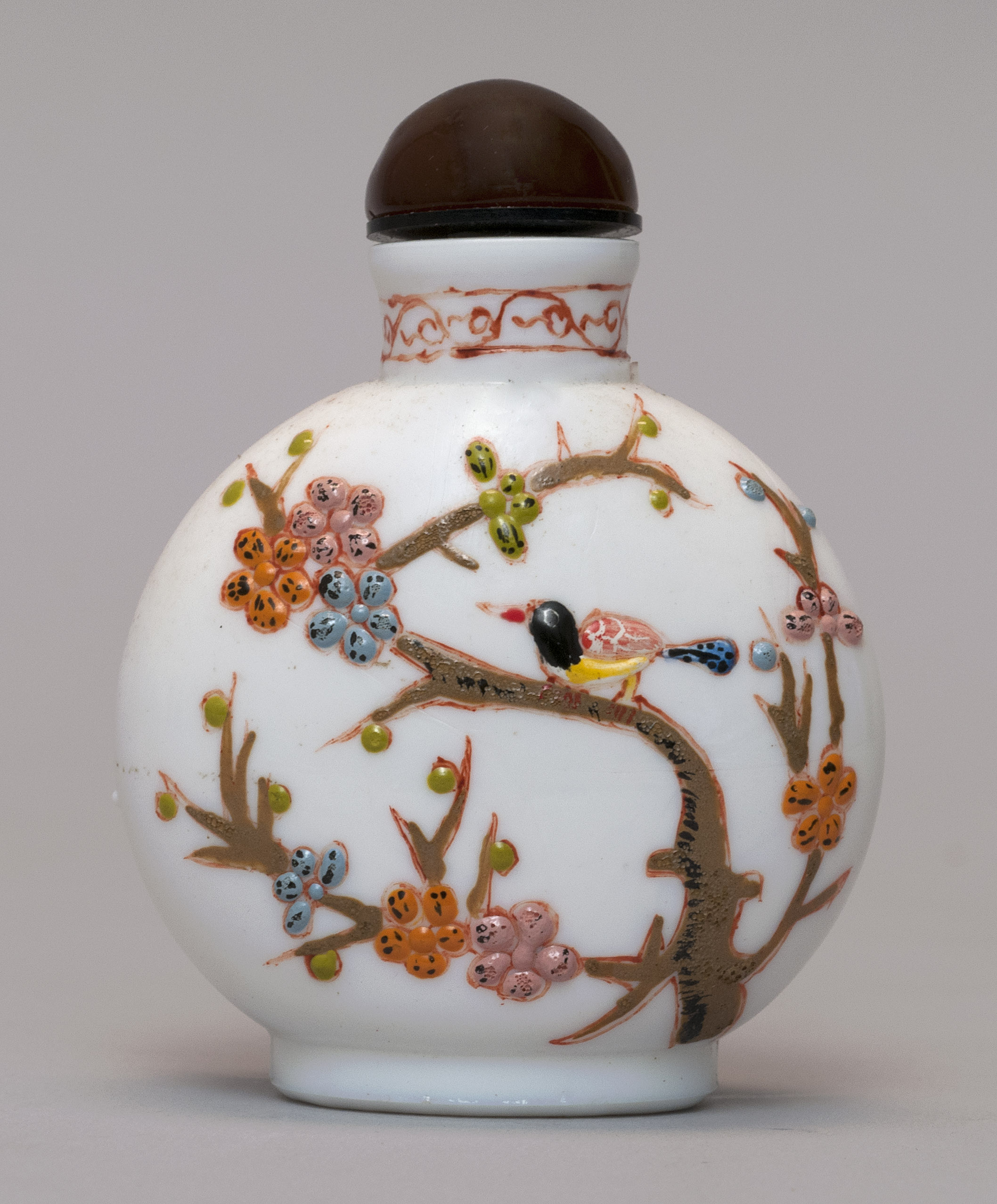 Appraisal: ENAMELED MILK GLASS SNUFF BOTTLE In ovoid form with bird