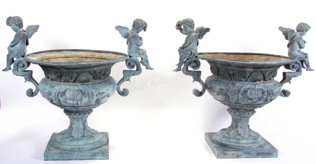 Appraisal: A pair of bronze patinated cast metal garden urns with