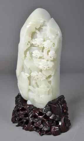 Appraisal: A Fine Chinese Carved White Jade MountainFinely carved to depict