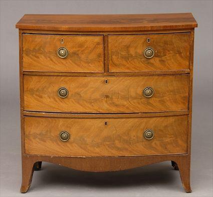 Appraisal: GEORGE III MAHOGANY BOWFRONT CHEST OF DRAWERS Containing cock-beaded drawers