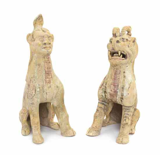 Appraisal: A Pair of Chinese Straw-Glazed Gilt and Painted Pottery Earth