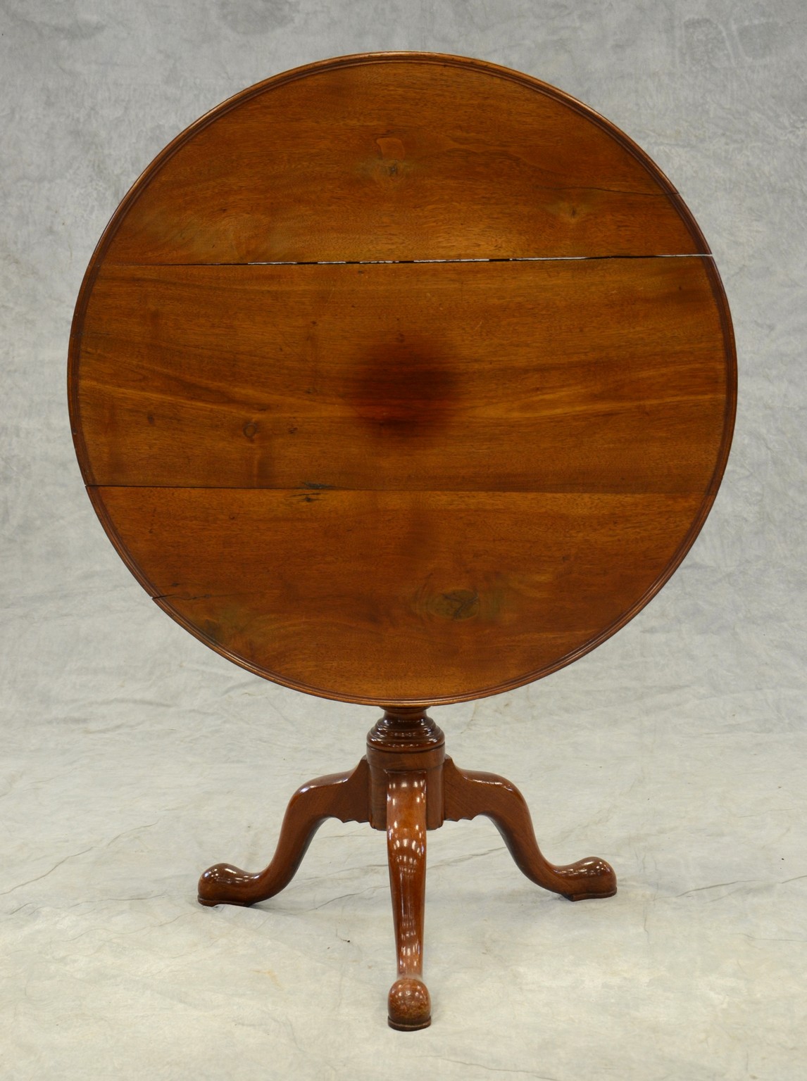 Appraisal: Walnut Chippendale tilt top birdcage tea table with suppressed ball