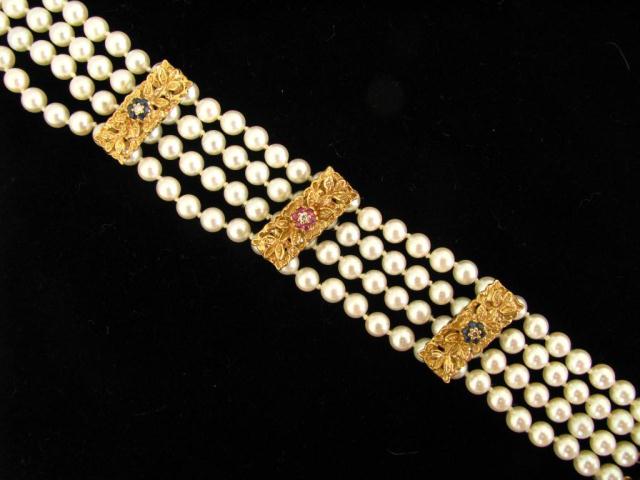 Appraisal: Four strand pearl bracelet with K yellow gold sapphire ruby